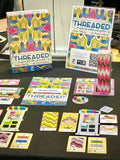 Threaded: A Game of Needles and Points